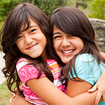 Two Girls Hugging